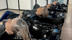 women getting their hair washed at paradigm hair salons panama city florida